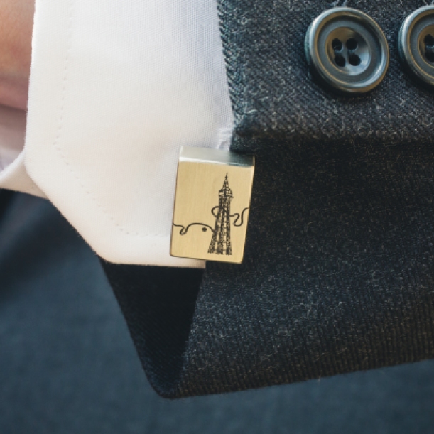 These cufflinks represent our two wedding locations, Blackpool and my home village on the river Mosel in Germany. They were a gift from my parents.